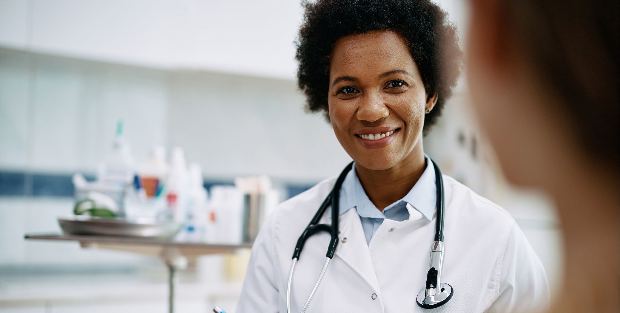 Doctor speaking with patient