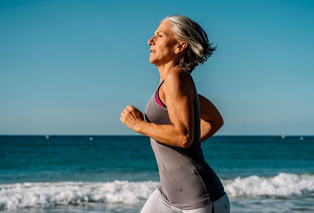 woman running on the beach