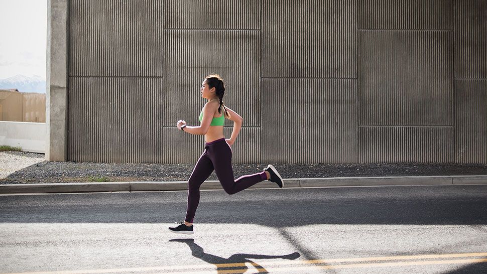 A woman running on the street