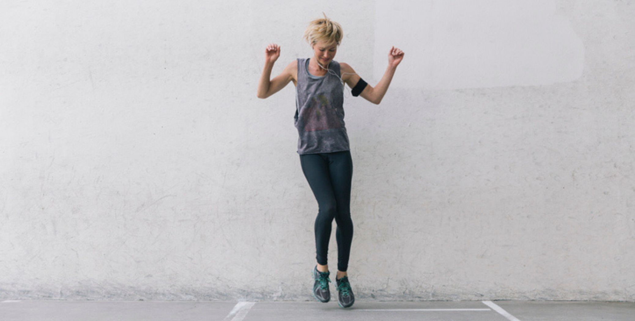 Woman listening to music and dancing