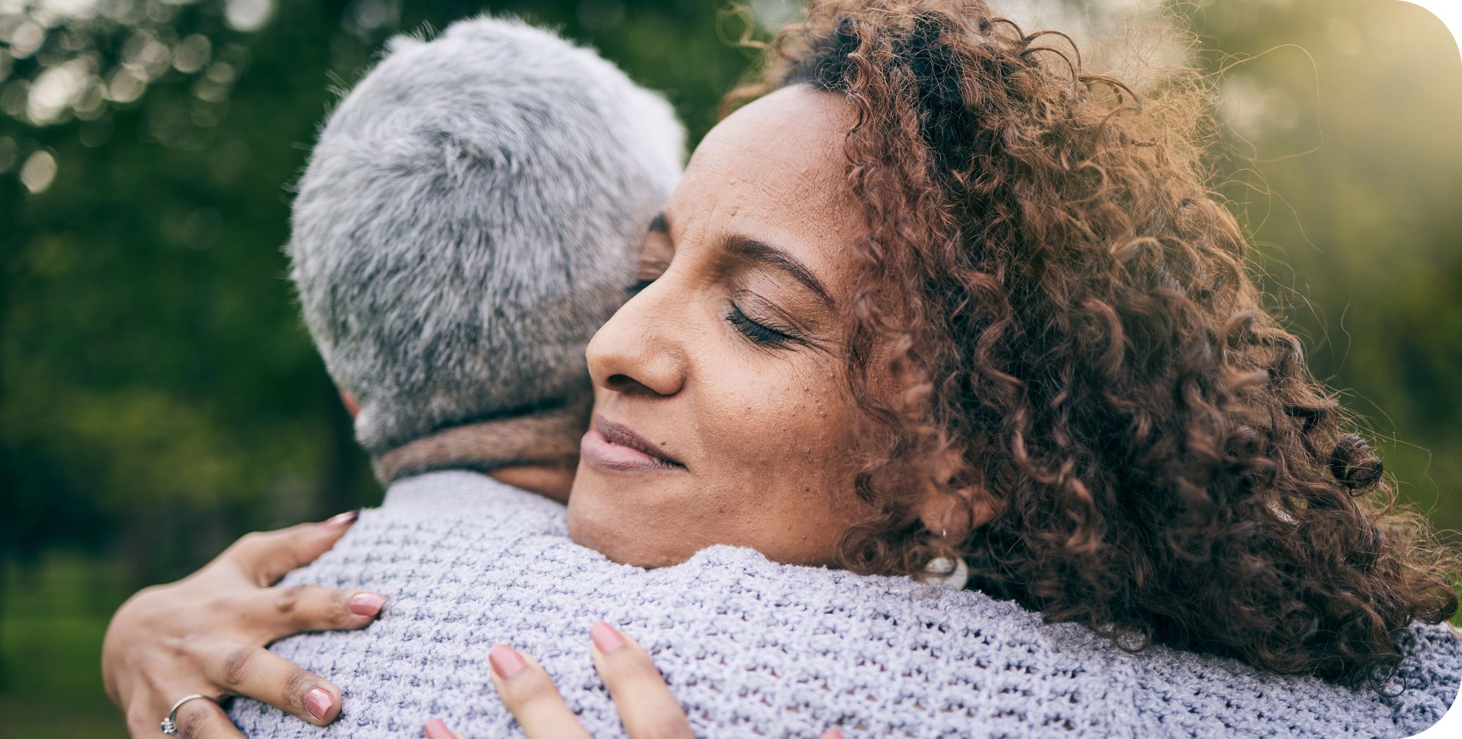 Hero Image woman hugging relative