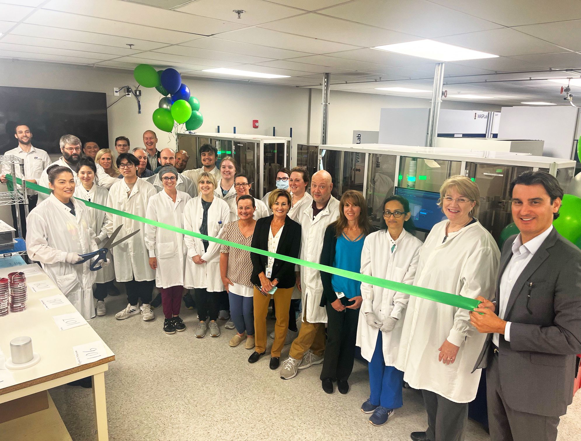 Ribbon cutting ceremony for the new microbiology automation line in the Lenexa, KS lab. 