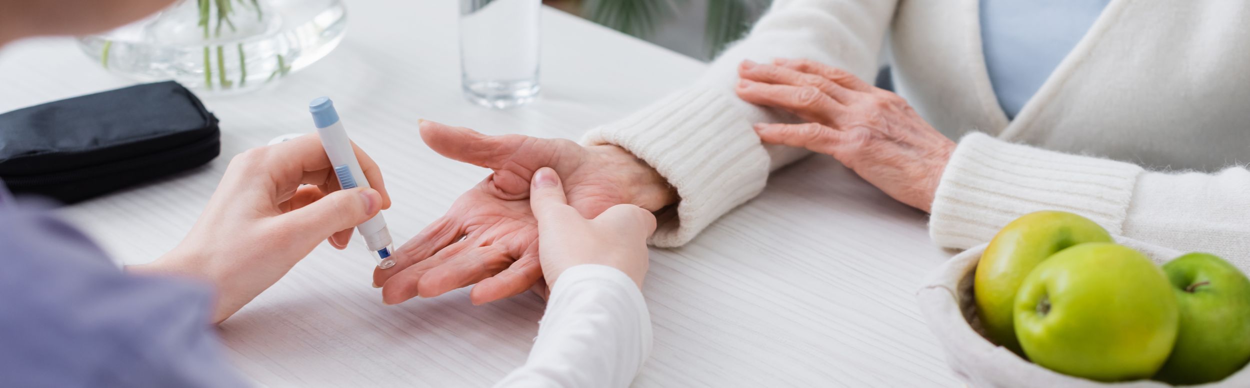 partial view of social worker doing insulin injection to aged diabetic woman, banner