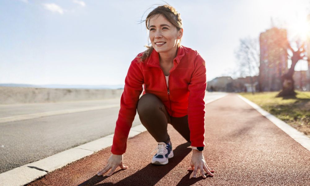 woman getting ready to sprint