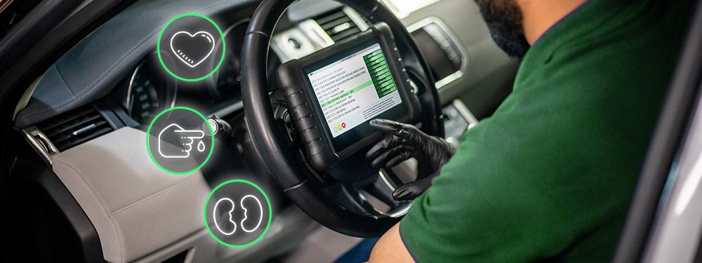 Technician working on a vehicle with icon overlay representing heart, diabetes, and kidneys