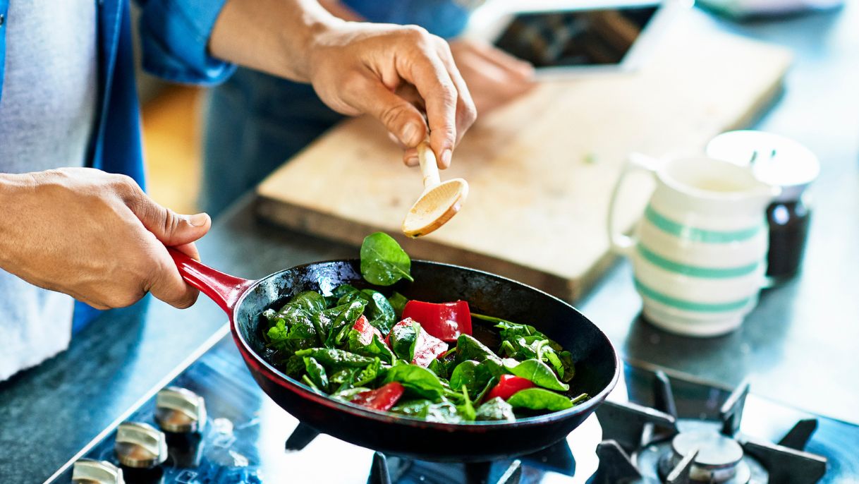 Person cooking with non-stick pan