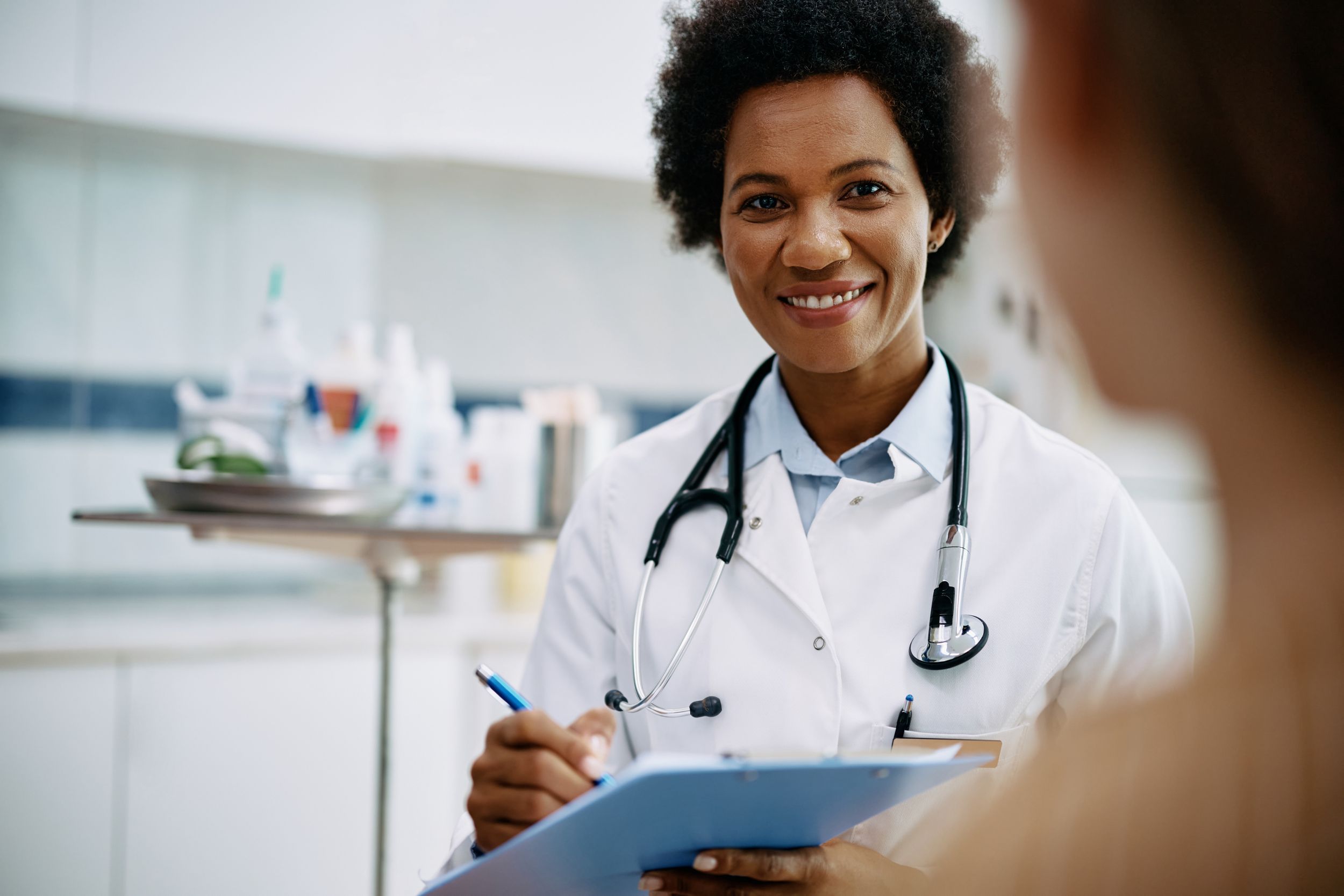 Young female doctor reviewing results