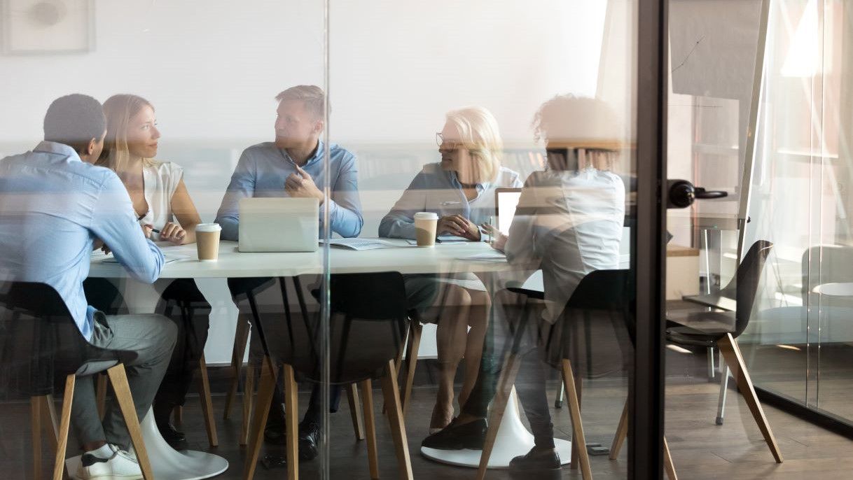 Group of diverse colleagues in conference room