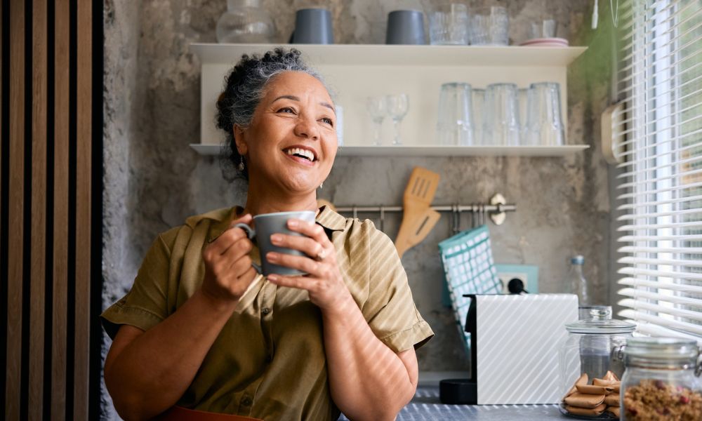 Woman holding coffee cup