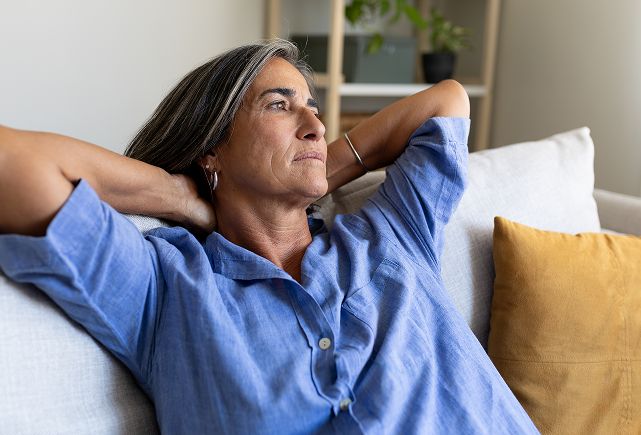 woman with hands on head