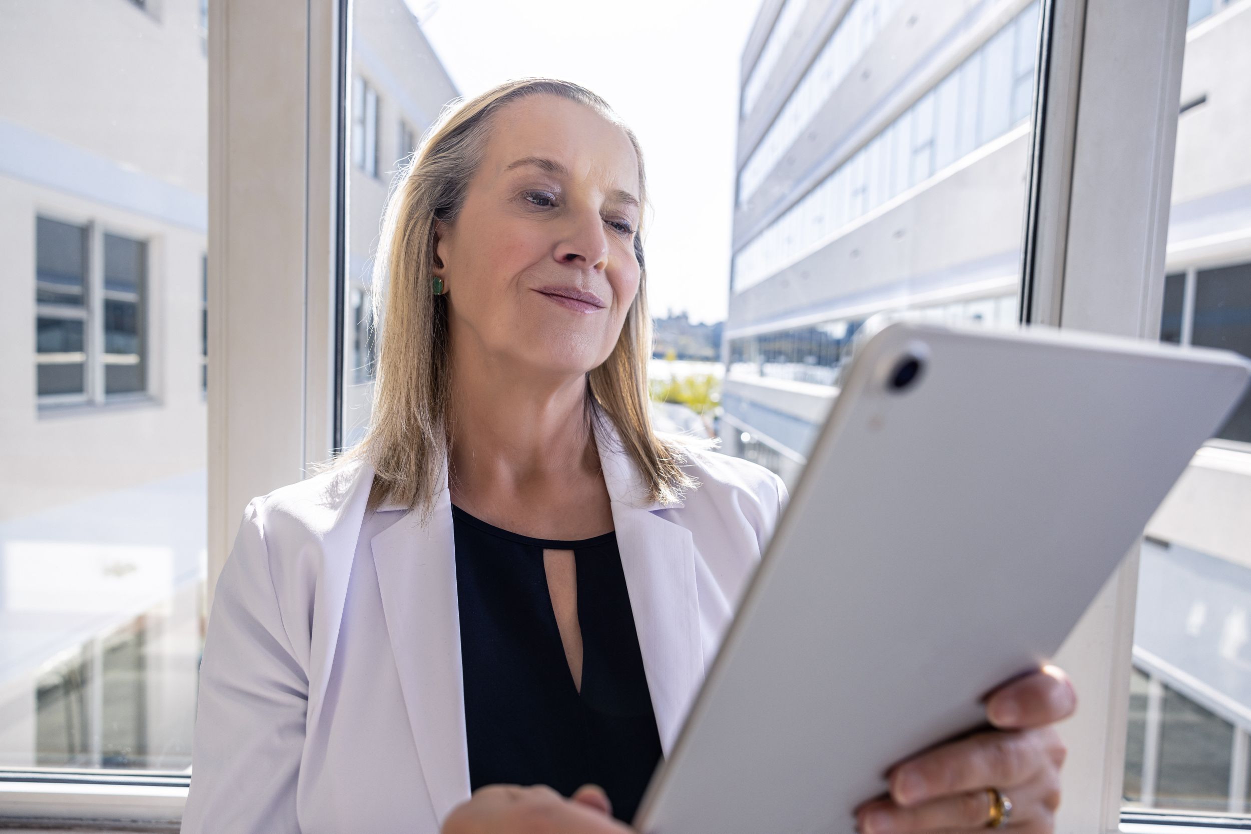 Physician and consultant discussing Quest's Lab Stewardship program