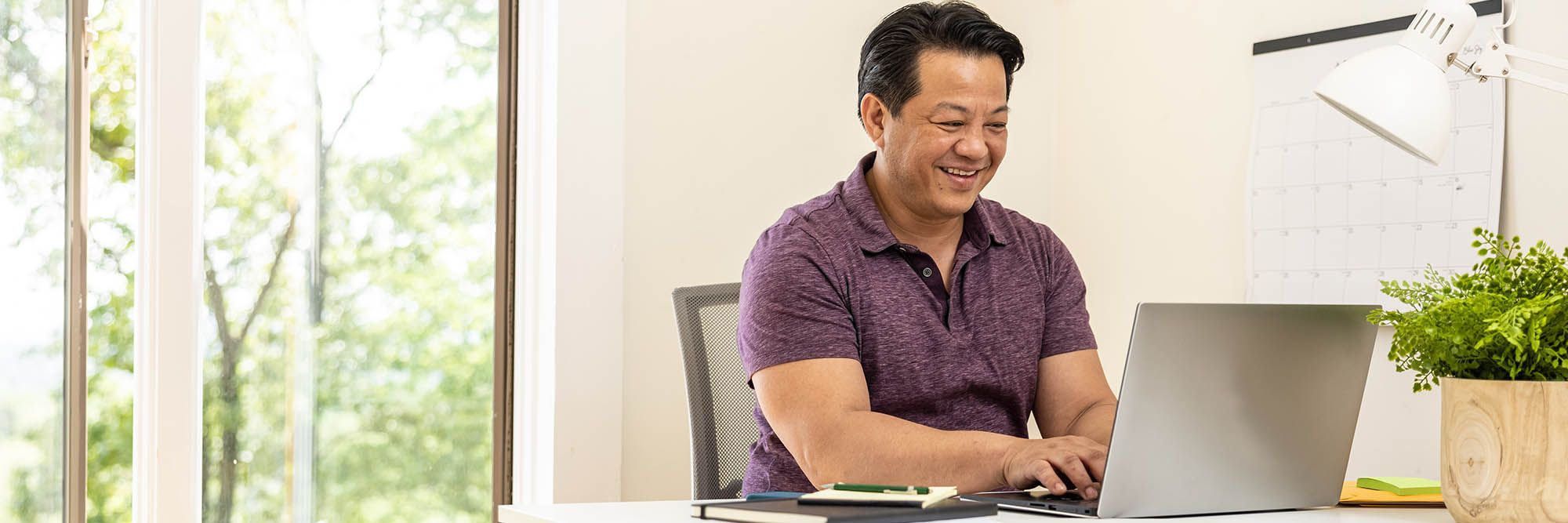 Man working on computer at desk