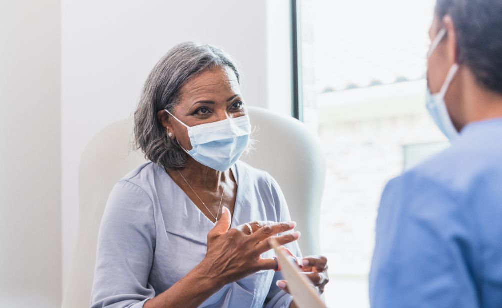 healthcare provider with female patient