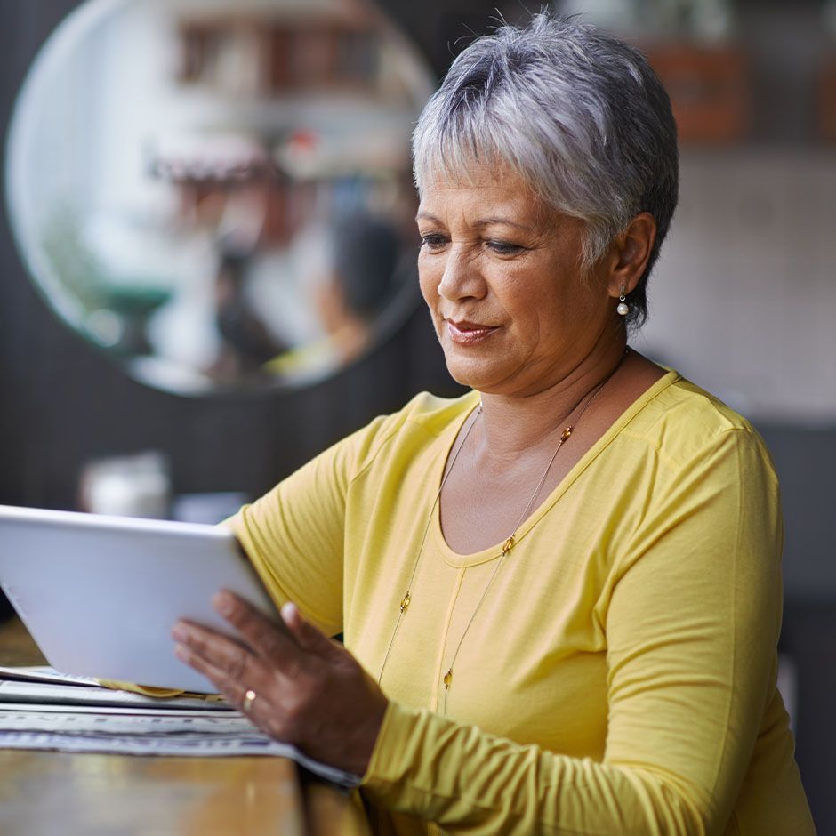 Person reviewing details on tablet