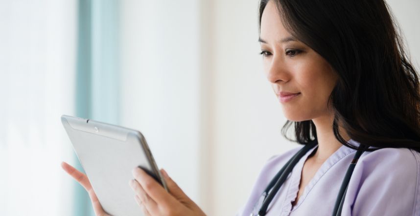 asian female doctor on ipad