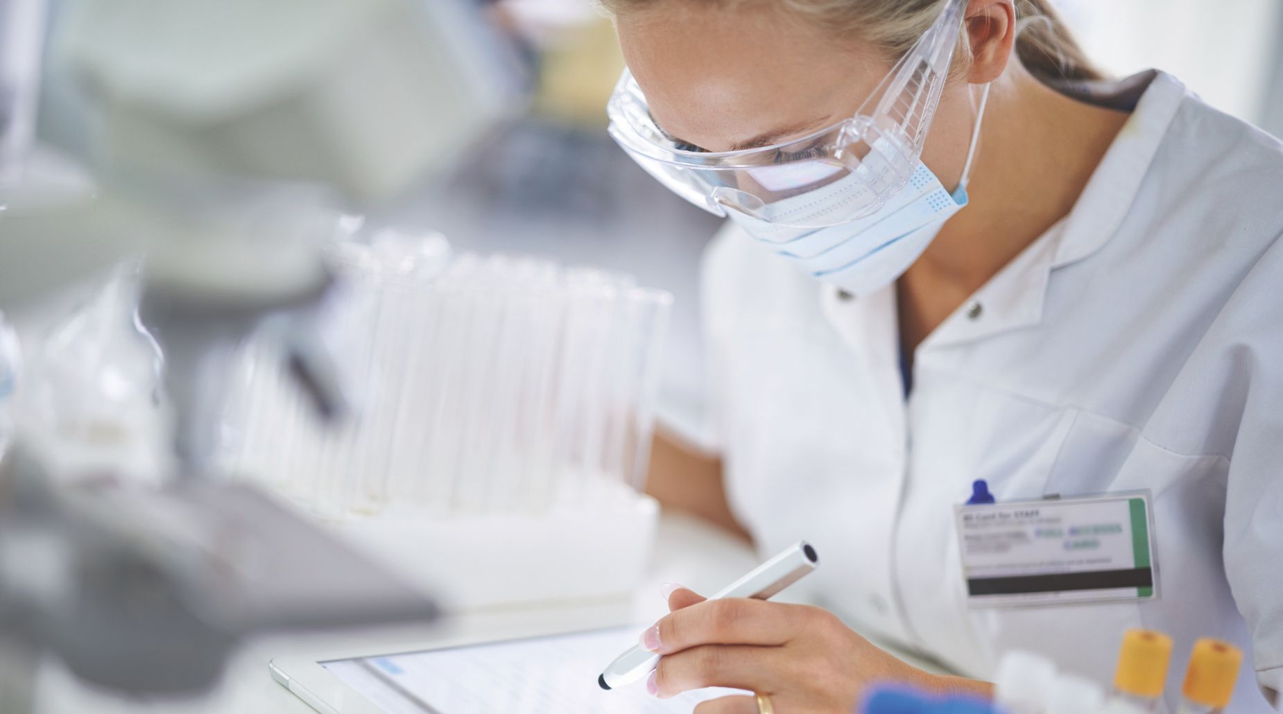 healthcare professional on tablet
