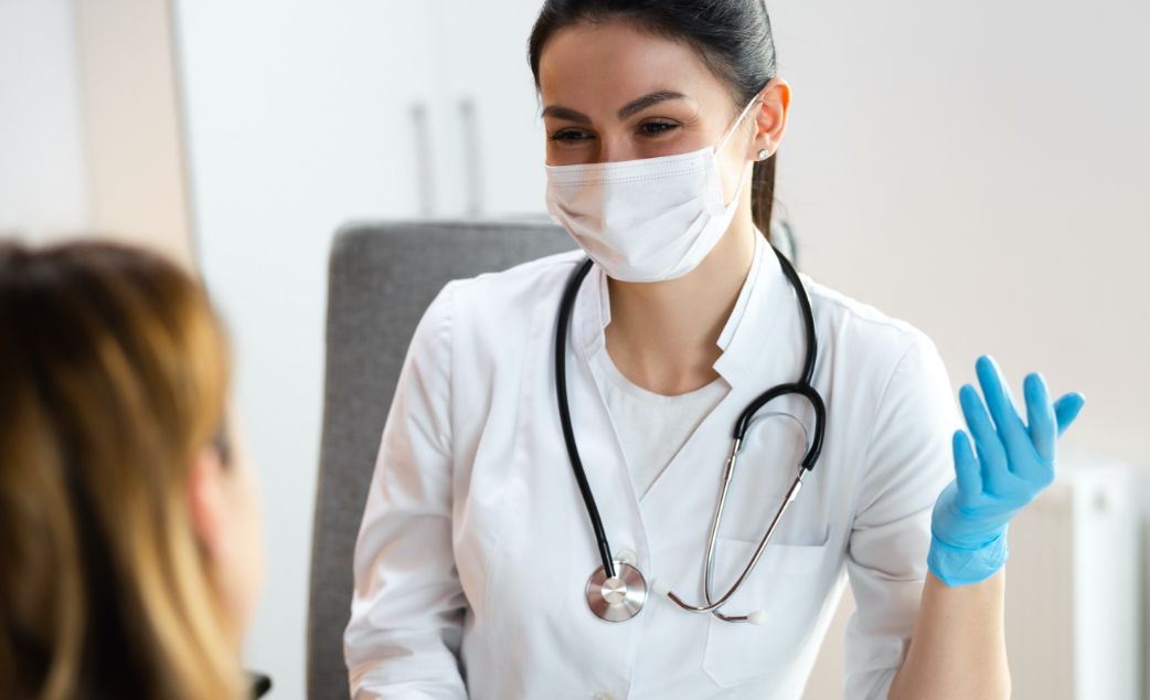 female doctor smiling at patient