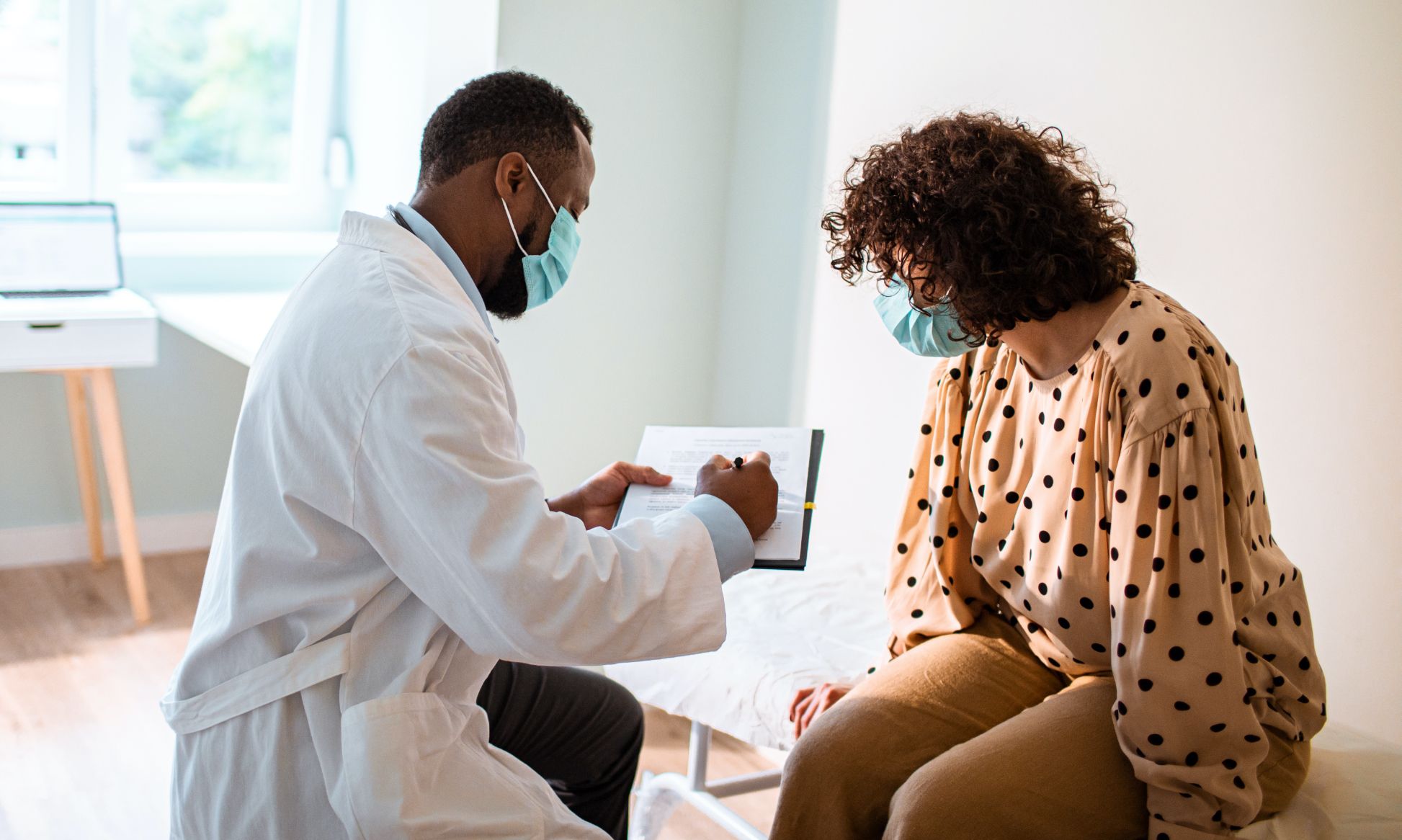 woman with doctor